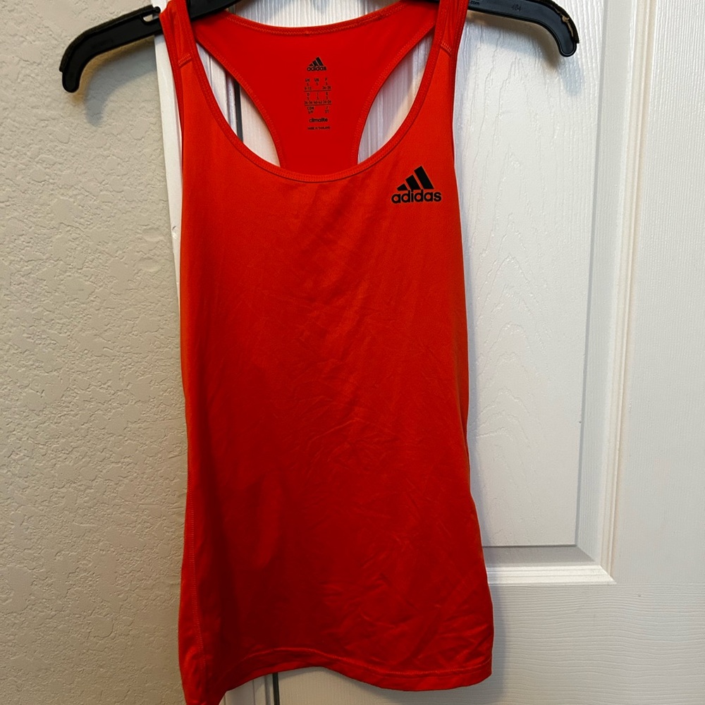 48. Hot pink Adidas tank